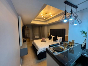 Elegant Studio with videoke at Azure North Pampanga